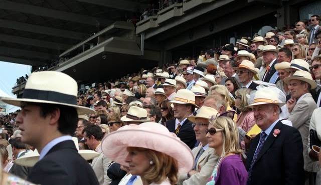 people at a stand at Glorious Goodwood events