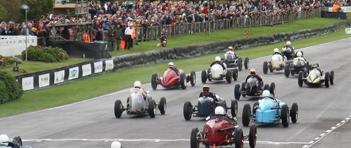 classic cars race at goodwood revival events